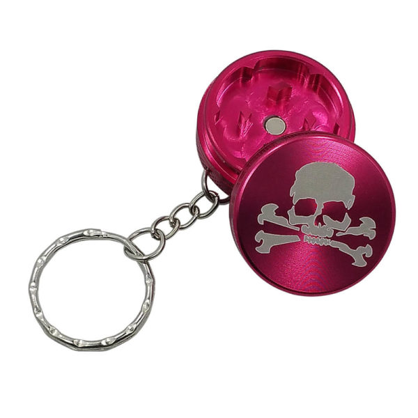 small red two piece keychain spice grinder skull and crossbones